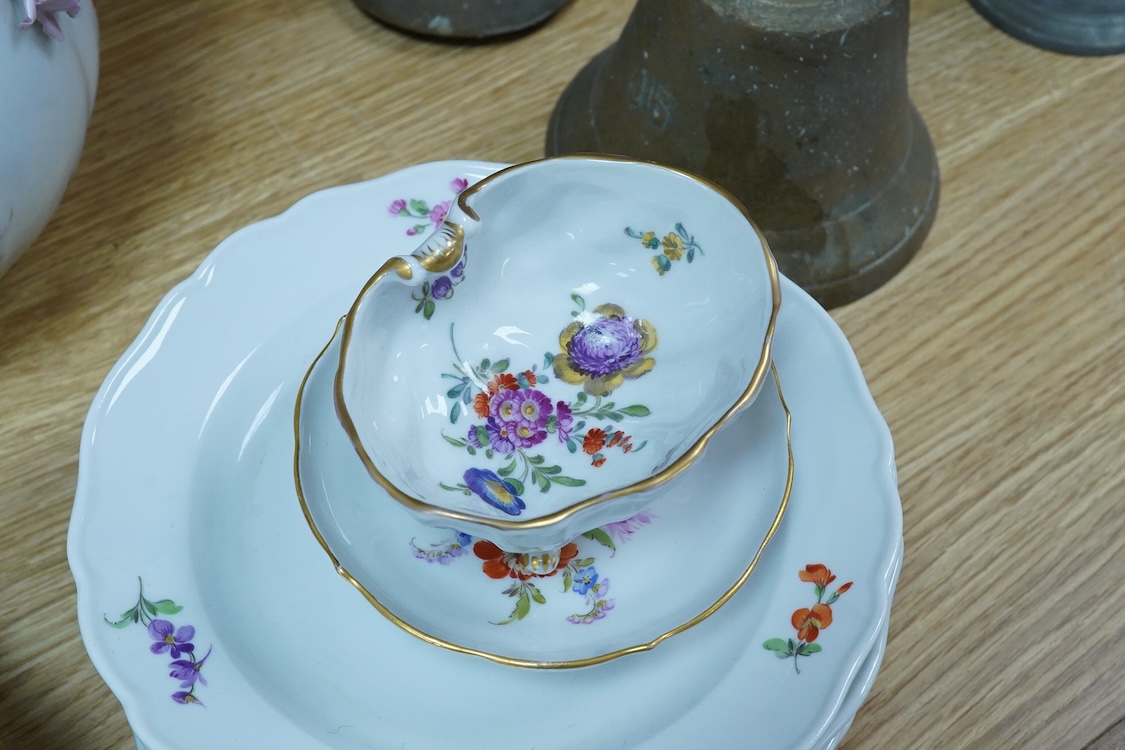 A collection of Meissen porcelain to include floral side plates and a German floral encrusted pot, 18cm high